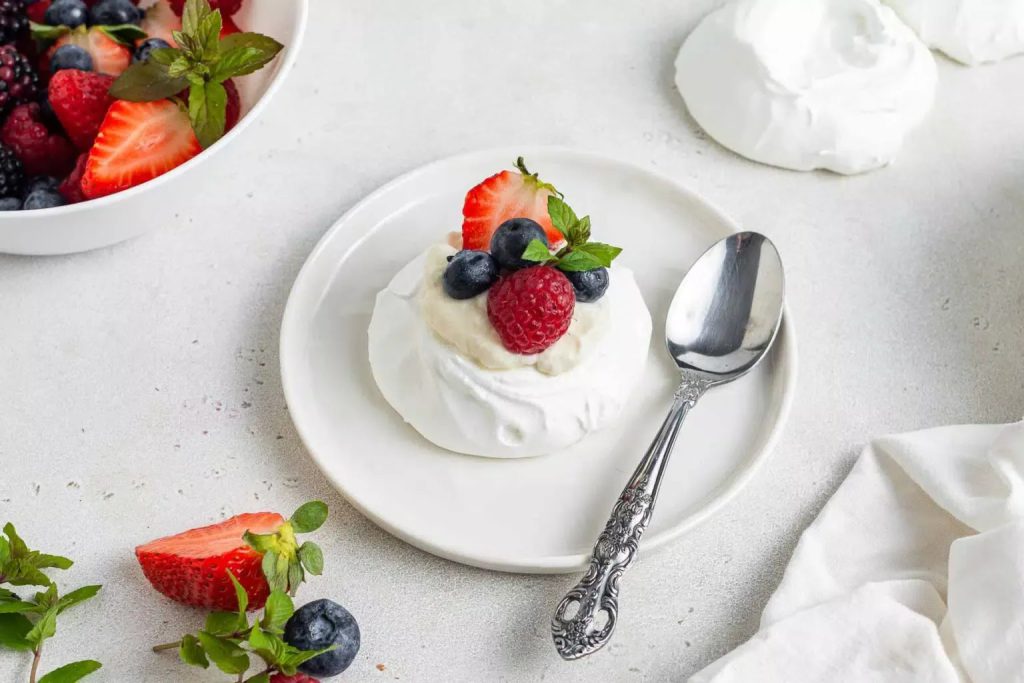 Dessert with tropical fruits Pavlova